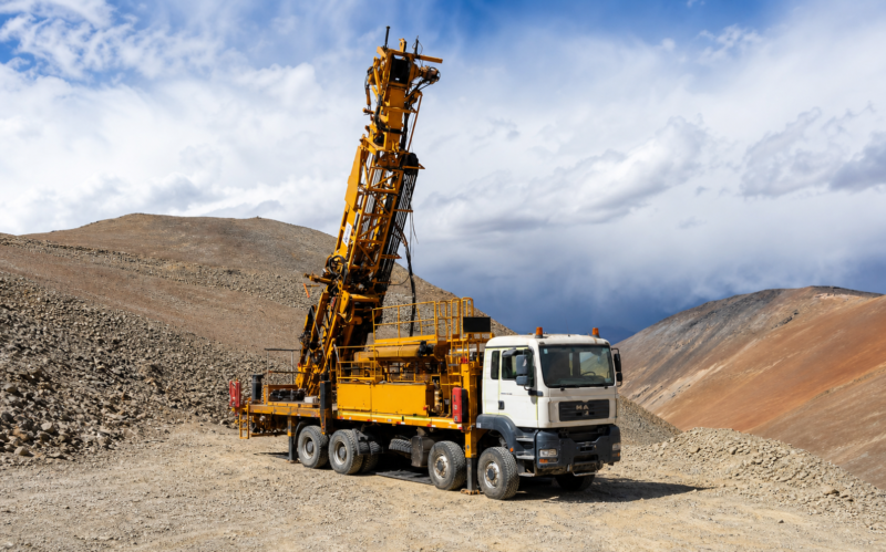 DE840 multi-purpose truck-mounted drill rig at a high-altitude site in Chile